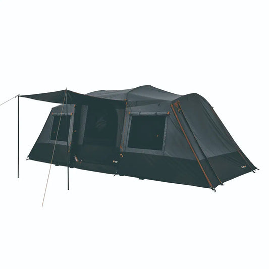 The OZtrail Fast Frame Odyssey 10P tent in dark grey and orange, showcasing its massive interior space and front awning for sun protection.