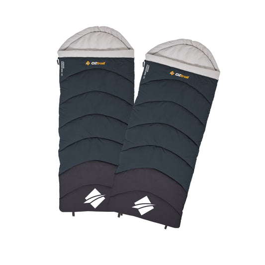 Two OZtrail dark grey sleeping bags with grey hoods on a white background