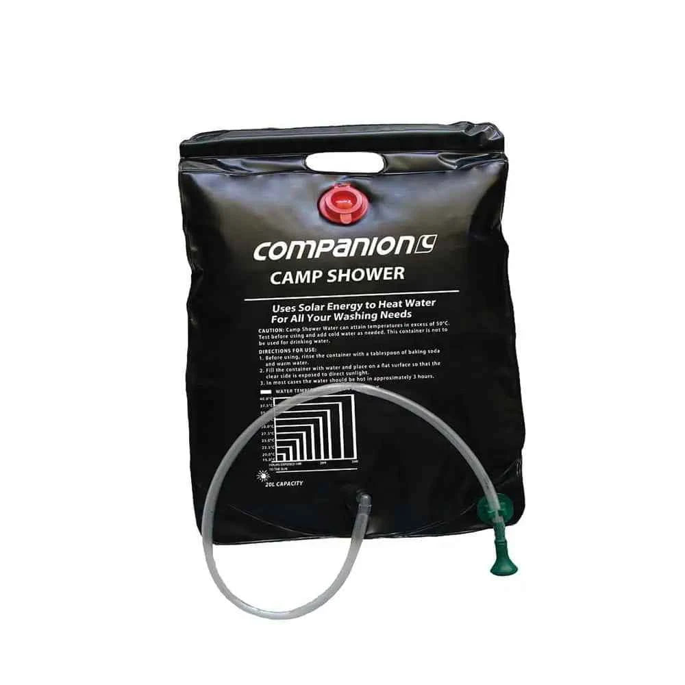 A black 20-liter Companion Pioneer solar shower bag with a clear hose, shower head, and integrated temperature gauge