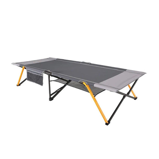  A grey and black single jumbo camping stretcher with a durable yellow and black frame, featuring an integrated side organizer pocket and an under-bed mesh gear loft for storage
