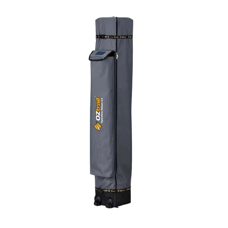 The side profile of the grey OZtrail gazebo carry bag showing the reinforced base and integrated wheels for easy transport.