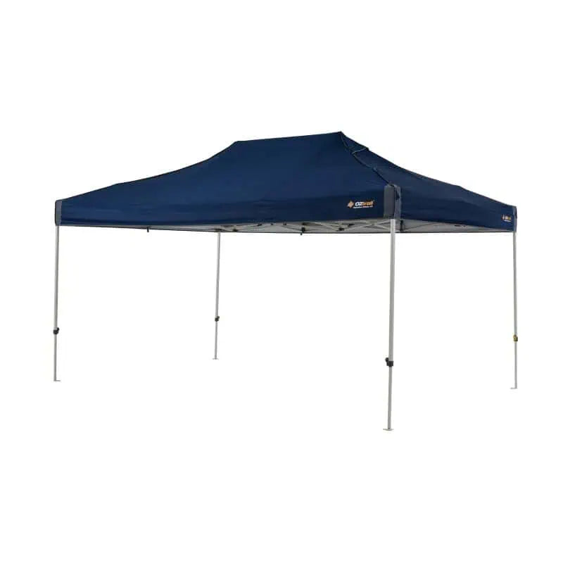 A large navy blue OZtrail Hydroflow Deluxe 4.5 pop-up gazebo fully assembled with a sturdy grey metal frame