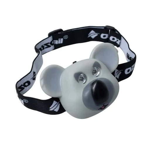 An angled view of the OZtrail Koala headlamp showcasing the 3D animal face design and the adjustable black and white branded headband with the OZtrail logo