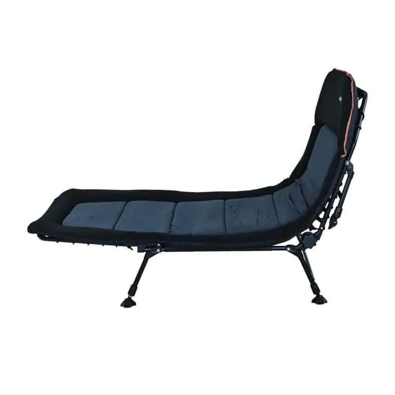 Side profile of the OZtrail Rhino Bed with the headrest adjusted to an upright, reclining position for use as a comfortable outdoor lounger
